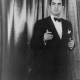 Portrait of Tyrone Power reciting the dramatic poem John Brown's Body: Photographer: Carl Van Vechten. Library of Congress Prints and Photographs Division, Portrait Photographs of Celebrities, LOT 12735, no. 933 [P&P]